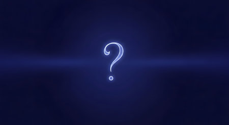 A single, luminous question mark glows with a soft white and blue light against a dark, deep blue background with a subtle horizontal flare. The image evokes concepts of mystery, questions, inquiry, the unknown, and seeking solutions.の素材