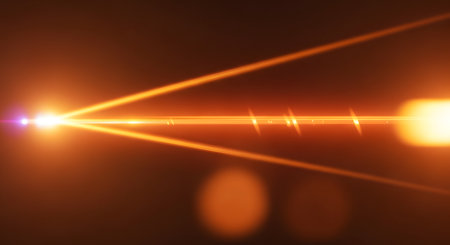 An abstract image of a bright, horizontal orange and yellow anamorphic lens flare on a black background. The flare includes light streaks and bokeh, creating a cinematic effect.の素材