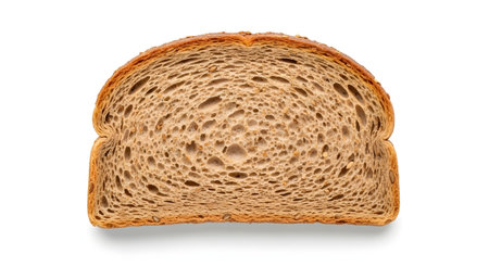 A single slice of whole wheat or multigrain bread, isolated on a white background with a soft shadow. The porous texture of the crumb and the dark crust, possibly with seeds, are clearly visible. This image represents food, baking, breakfast, and healthy eating.の素材