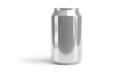 A clean, silver aluminum beverage can is shown standing upright against a plain white background. The shiny, reflective, unbranded can serves as a product mockup for soda, beer, or energy drinks, with a slight shadow underneath.の素材