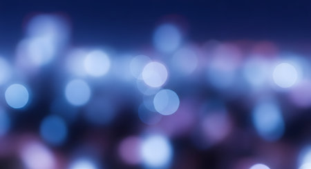 An abstract, out-of-focus background filled with soft blue and purple bokeh circles. The blurred lights create a dreamy, magical, or nighttime ambiance, suitable for a backdrop or overlay.の素材