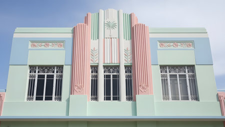 A stunning Art Deco building facade featuring pastel pink, green, and blue colors with intricate floral and geometric relief details. The symmetrical architecture and vertical lines evoke the classic style of Miami Beach's historic district.の素材