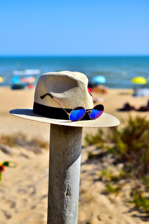 Beach hat with sunglassesの写真素材