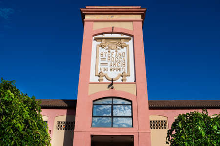 CAGLIARI, SARDINIA, ITALY - 07/23/2020: 51/5000 old vintage Italian winery distillery in perspective - Rocca Ancis - front viewのeditorial素材