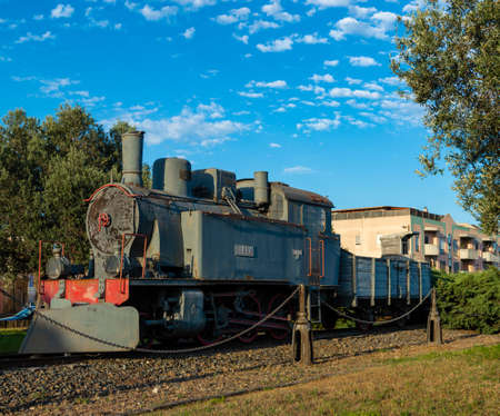 Monserrato, Sardinia, Italy - 07/23/2020: Old Italian Locomotive Giara built by Ernesto Breda in 1917 with cloudy sky in the backgroundのeditorial素材