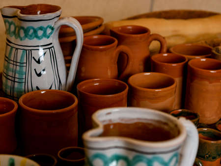 various assorted handmade pottery such as glasses and jugsの写真素材