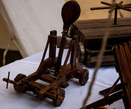 small wooden catapult model, miniature reproduction of medieval siege weaponの写真素材