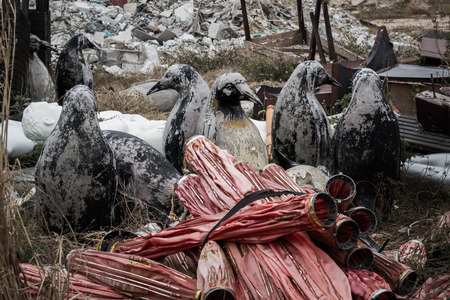 Figures of penguins on the dumpの写真素材