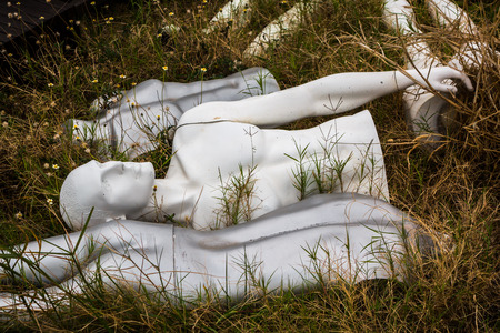 Figures of mannequins on the dumpの写真素材