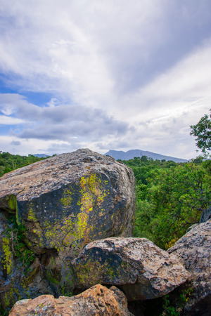 A pile of boulders, covered with lichen in the mountains of Sicilyの写真素材
