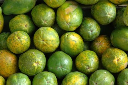 Retail Background of Fresh Guava Fruits at a Market Stallの写真素材