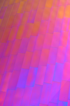 Abstract Background Texture Of A Brightly Colored Tiled Wallの写真素材