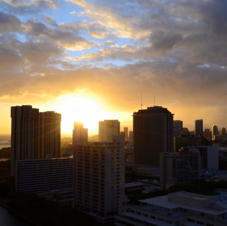 Urban Landscape Of A Dramatic Downtown Honolulu Sunsetの写真素材