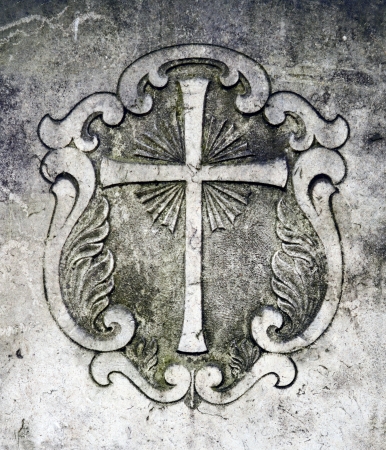 Detail Of A Crucifix On An Ancient Gravestoneの写真素材