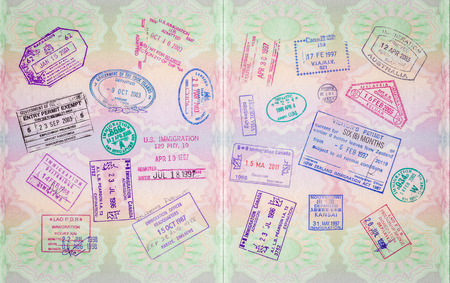 Retro Vintage Stamps In A European Passport From Multiple Locationsの写真素材