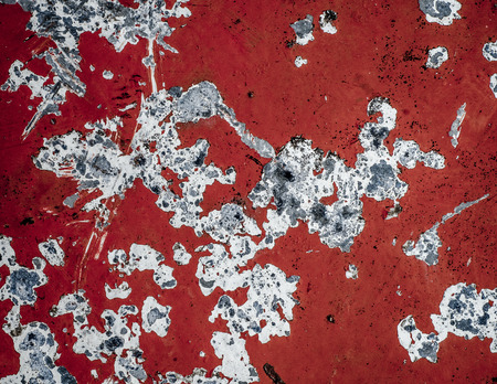 Scratched And Damaged Red Painted Metal Texture Surfaceの写真素材