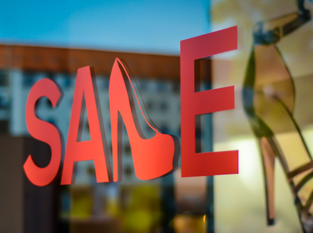 A Sale Sign In A Shoe Store Windowの写真素材