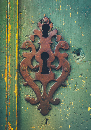 Vintage Ornamental Keyhole On A Rustic Old Door In Toulouse Franceの写真素材