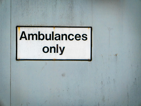 A Grungy Ambulances Only Sign At A Hospital Emergency Roomの写真素材