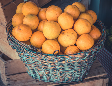 Rustic Basket Of Organic Oranges At A Health Food Storeの写真素材