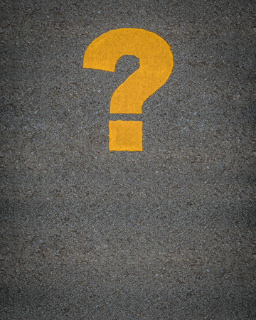 Conceptual Image Of A Question Mark As Yellow Asphalt Road Markings