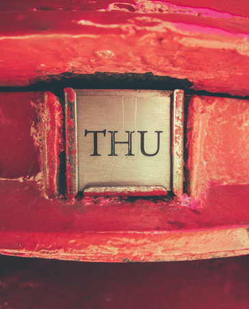 Retro Style Detail Of The Collection Sign On A Traditional Red British Royal Mail Post Boxの写真素材