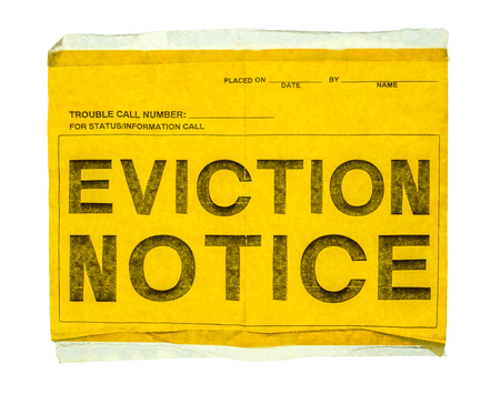 Isolated Eviction Notice On Yellow Paper With Sticky Tap On A White Backgroundの素材 [FY310115523559]