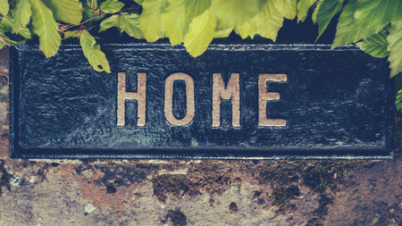 Retro Styled Image Of A Hidden Home Signの写真素材