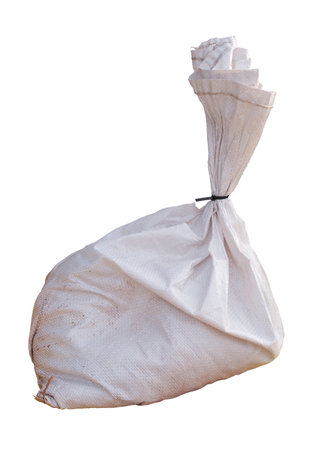 A sandbag to be used for flooding, or to weigh something down, isolated on a white backgroundの写真素材