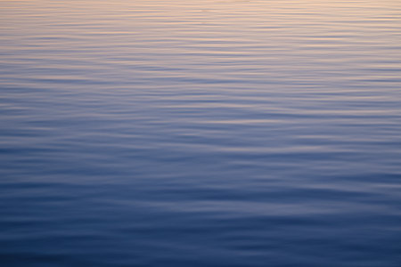 Background Texture Of Ripples In A Lake Or River Or Loch At Duskの写真素材