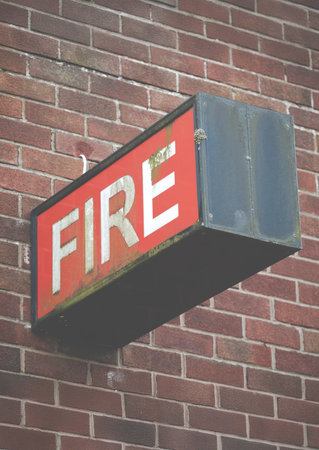 A Grungy Old Sign For The Fire Serviceの写真素材