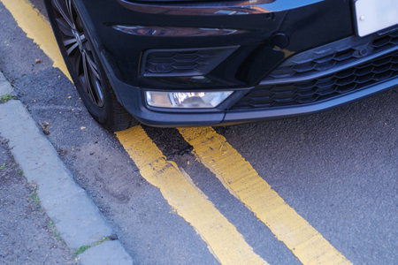 Car Parked On A Double Yellow Line In The UKの写真素材
