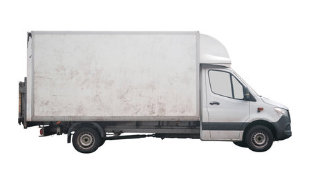 Side View Of Grungy White Box Truck Or Delivery Van With Cargo Space Isolated On White Backgroundの写真素材