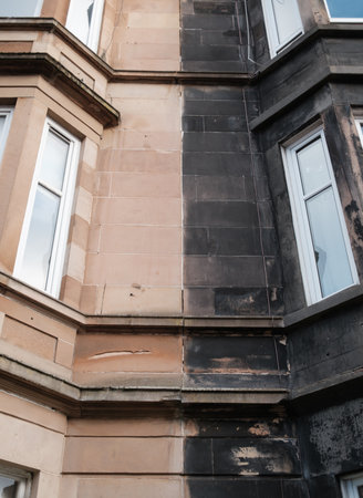 The Contrast Between A Glasgow Tenement That Has Been Cleaned And One That Hasn'tの写真素材