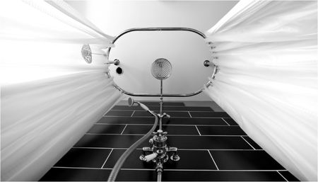 Underneath an old style showerの写真素材