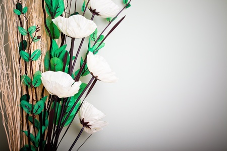 Stylish flower arrangement against a wallの写真素材