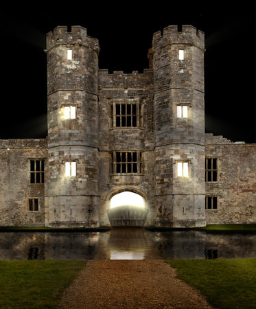 Castle at night with moat and lights shiningのeditorial素材