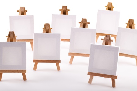A collection of blank canvases on easelsの写真素材
