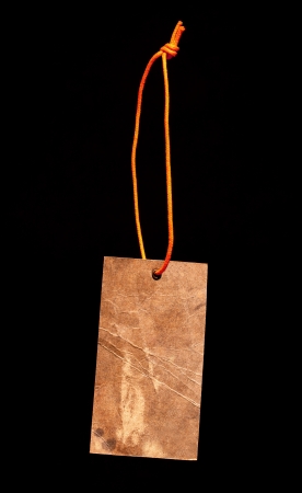 Brown paper label with orange stringの写真素材