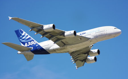 UK - JULY 26th - FARNBOROUGH AIR SHOW: AirBus  A380 passenger plane in flight. The double decker, wide body plane was first brought into service in 2007のeditorial素材