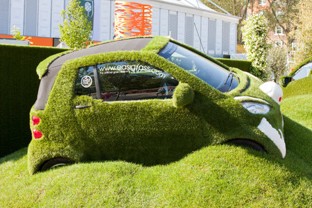 LONDON - MAY 2012 - RHS CHELSEA FLOWER SHOW: The Chelsea Flower Show has been running since 1862. The EasiGrass Easibug car showing artificial grass is part of the gold award winning Best Fresh Garden entry.のeditorial素材