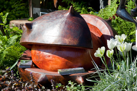 LONDON - MAY 2012 - RHS CHELSEA FLOWER SHOW: The Chelsea Flower Show has been running since 1862. Large wooden sculpture of a horse chestnut. One of many amazing sculptures.のeditorial素材