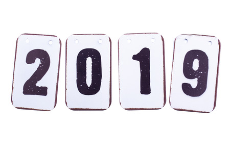Year 2019 date in numbers made of metal tiles with hanging holes. Isolated on a white backgroundの写真素材