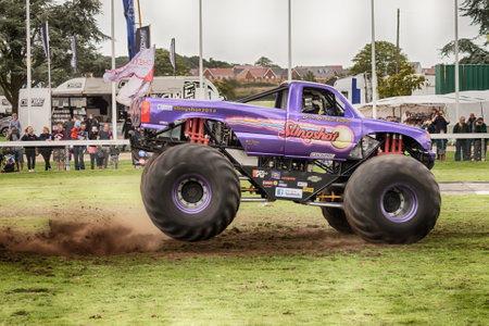 NORFOLK, UK - AUGUST 19th, 2017: Truckfest Norwich is a transport festival in the UK based around the haulage industry located in Norfolk. Including Monster Truck Slingshot driven by Alan Vaughanのeditorial素材