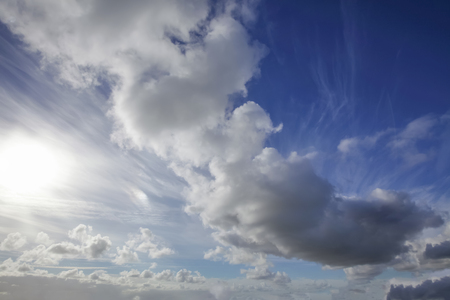 Beautiful skies with white clouds and sunshine. Blue sky and heavenly sunlight nature backgroundの写真素材
