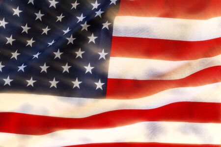 USA flag waving in the wind. American symbol of patriotismの写真素材