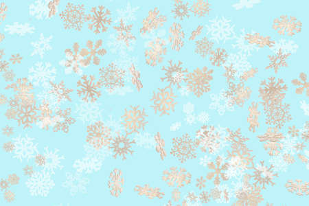 Beautiful snowflake pattern white and gold falling on a sky blue backgroundの写真素材