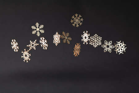 Snowflake Christmas symbols on a black backgroundの写真素材