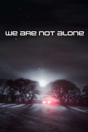 We are not alone, UFO abduction concept. Car parked on a moon lit misty winters night in a rural Norfolk field. Stars and full moon light the sky. Why are they out here in the dead of night? Are they looking for you!の写真素材