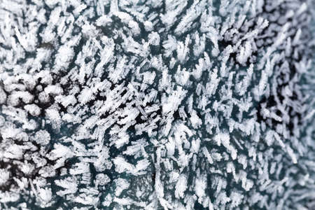 Ice crystals close up in winter. Freezing water macro backgroundの写真素材